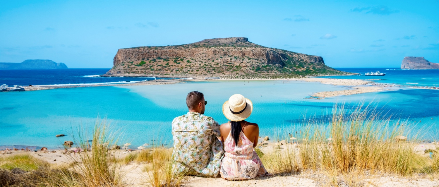 A couple on a beach in Crete.