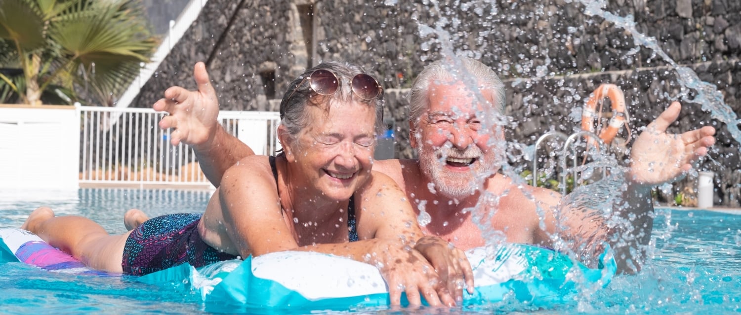 Mature couple in a swimming pool