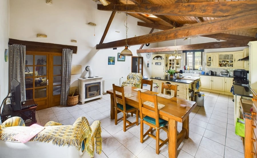 A kitchen within a renovated stone farmhouse