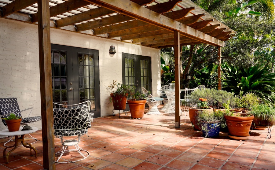 The porch of a Sarasota stucco cottage.