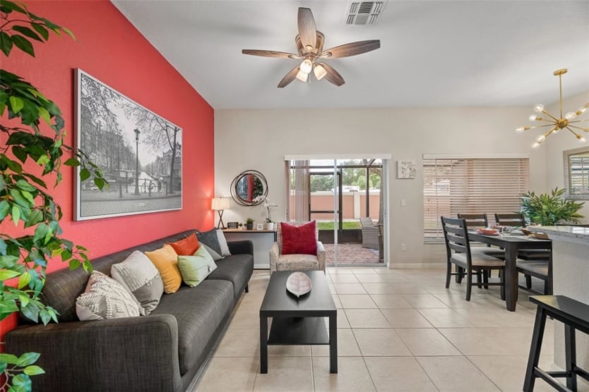 A four-bedroom home with a red feature wall