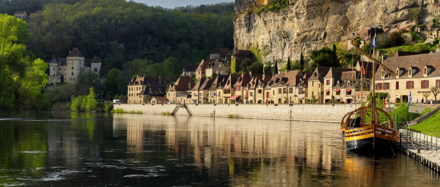 A row of houses along the river front in Dordogne