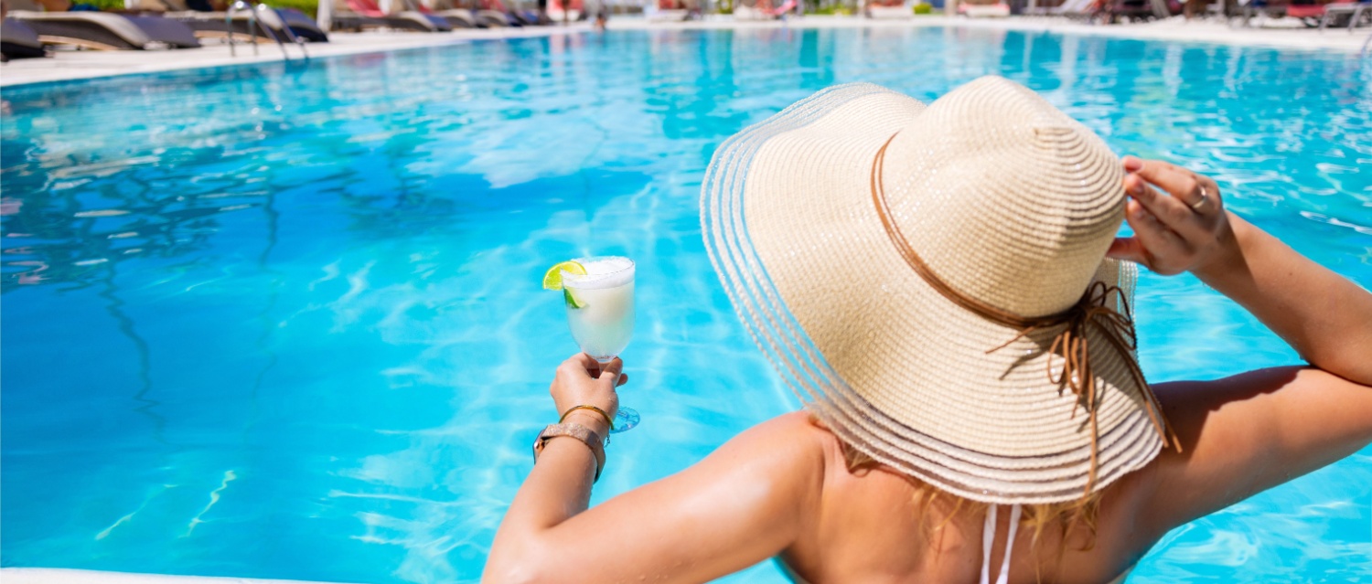 A woman reclining in a Florida resort pool