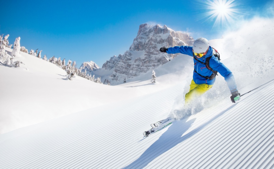 A skier on the slopes of the Dolomites