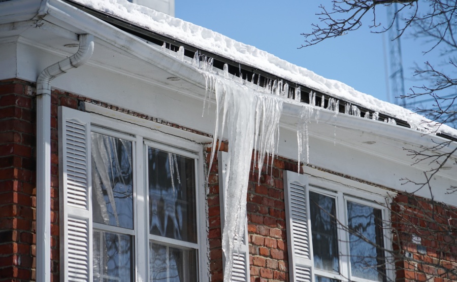 icicles and a damaged gutter