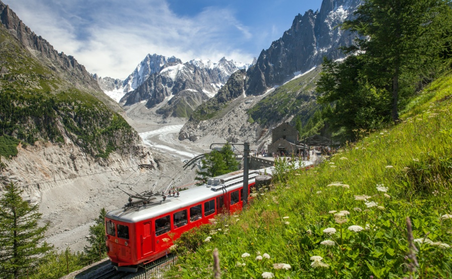 A train carrying passengers to the Chamonix in summer