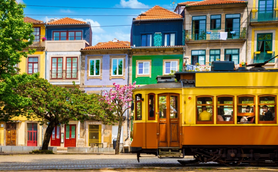 A street in Porto with a tram in the foreground