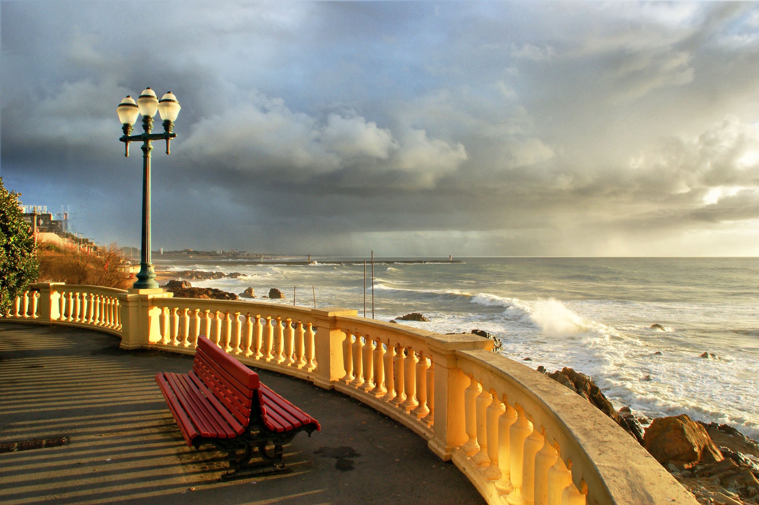 A quiet bench by the sea in Foz do Douro, Porto