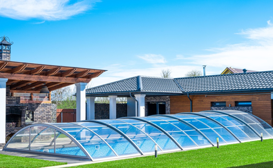 A French pool with a Perspex shelter installed