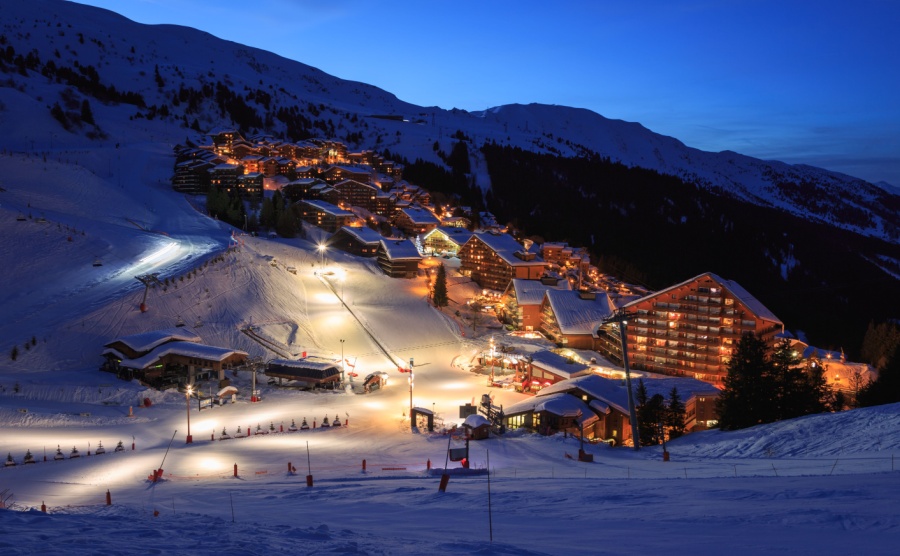 Homes on the Meribel slopes lit up at night