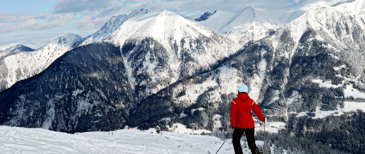 A skier looking out over La Plagne